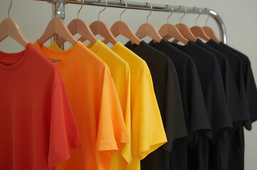Obraz premium Assorted T-Shirts in Retail Clothing Rack Display, Generative AI
