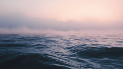 Fototapeta premium Softly glowing waves caress the shore as a misty veil ascends into the sky, blending with the fading light of day , ocean. Veiled Ocean. Illustration