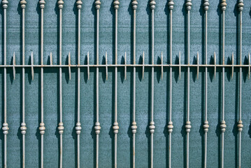 metal fence with green mesh
