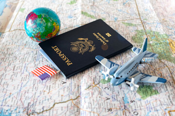 passport, globe and airplane model on world map background, travel concept © kosoff