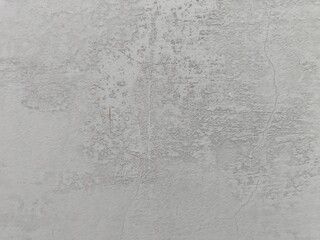 Grey abstract grunge concrete wall rusty texture stone wall papercut texture vintage decorative wide wall background.Grey rough crack cement texture stone concrete,rock plastered stucco wall.