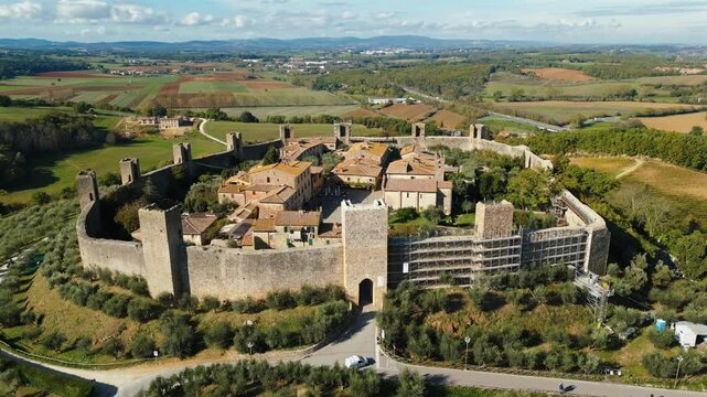 Aerial view of Monteriggioni medieval village in summer season. Monteriggioni, Siena, Tuscany, Italy