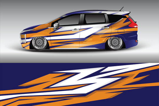 Sleek modified car with vibrant blue and orange graphics parked against a minimalist background