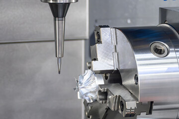 The 4-axis CNC milling machine cutting the turbocharger part with solid ball nose end mill tool.