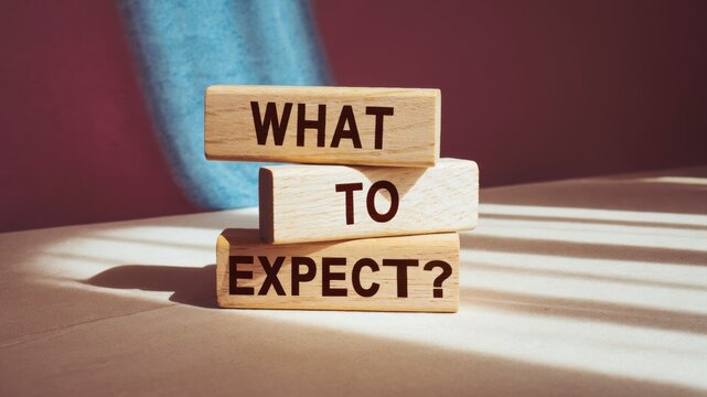 Concept of what to expect written on wooden blocks