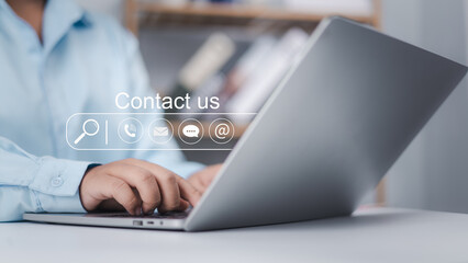 Contact us or email marketing concept, Website page, Customer support hotline, Contact us laptop online, Business Woman sitting and working on computer, Email, Phone, Address, Chat message icon.
