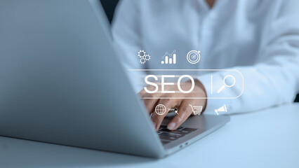 Businesswoman using a computer for analysis, SEO search engine optimization marketing Ranking...