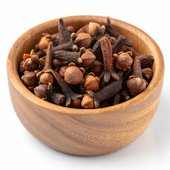 Clove spice in wooden bowl isolated on white background