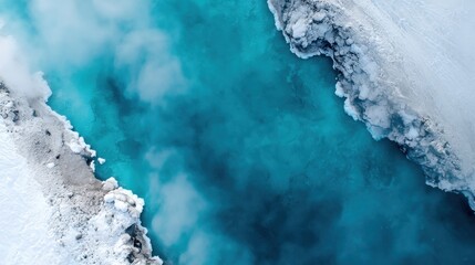 Abstract blue water texture with rocky edges.