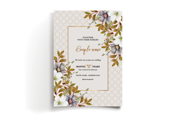 WEDDING INVITATION FRAME WITH FLOWER DECORATIONS AND FRESH LEAVES