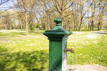Vintage Green Water Fountain in a Scenic Park