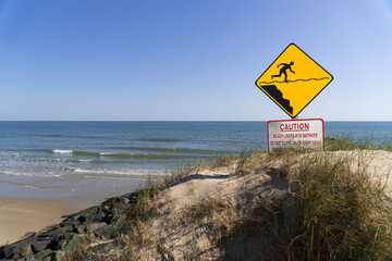 warning sign on the beach