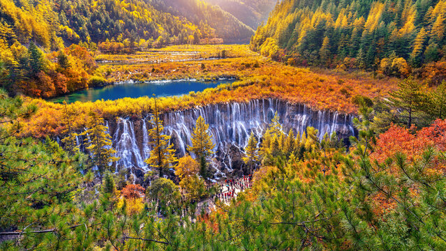 Nuorilang waterfall in Jiuzhaigou national park, China. Autumn in Sichuan.