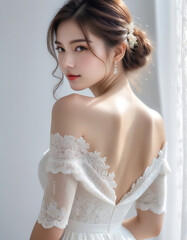 Beautiful beautiful bride model woman with beautiful hairstyle and makeup in elegant wedding dress. エレガントなウェディングドレスを着た、美しいヘアスタイルとメイクをした美しい花嫁モデルの女性
