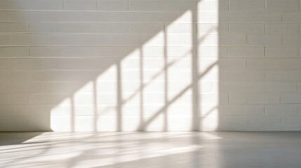 Obraz premium Sunlight casts patterns on a bright white interior