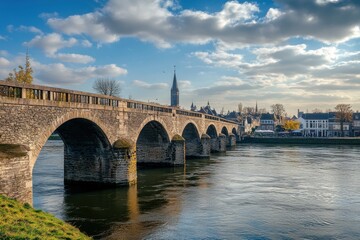 Fototapeta premium Historic Maastricht: Iconic Bridges Over Water in a Charming European Cityscape