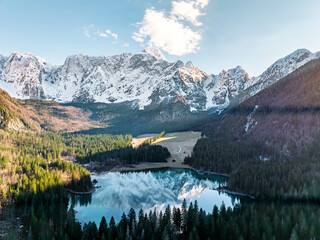 Naklejka premium Beautiful Reflections of Mangart on Lake Fusine (Laghi di Fusine, Italy Tarvisio