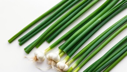 Clipping path included, top view flat lay of fresh garlic chives on white background.
