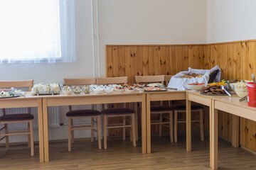 Refreshments on tables in the form of a banquet