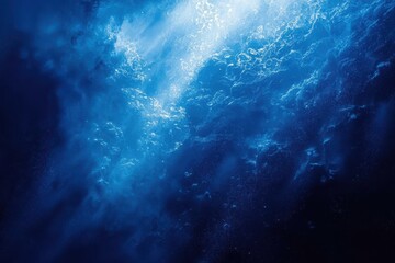 Underwater Surface Light Rays Through Deep Blue Ocean Water