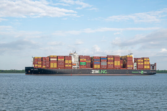 Liquified natural gas-powered container ship ZIM Coral sails out of Charleston Harbor, SC, USA  on April 09, 2025.
