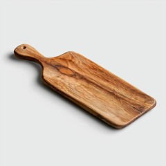 Fototapeta premium Wooden cutting board with handle on light background
