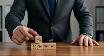 Interest Rates Management: Businessman Adjusting Percentage Blocks