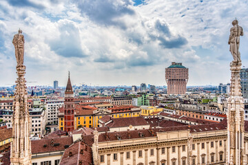 View from the rooftop of the Milan Cathedral (Duomo di Milano), one of the most famous Gothic cathedrals in the world, overlooking the city of Milan, Italy