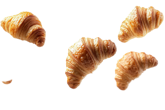 Golden Croissants Falling Delicious Bakery Treats isolated on transparent background