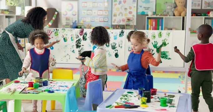 Painting, students and woman with children, teaching and education for group in daycare and learning. Talking, teacher and hands with color for growth, development and art for kids in preschool