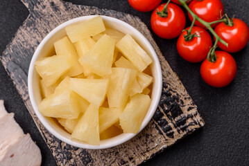 Tropical sweet tinned pineapple fruit sliced into slices