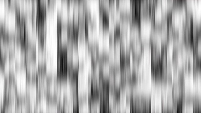 Abstract Cityscape: A mesmerizing black and white shot captures the chaotic and structured allure of urban life. The blurred yet defined details create a visually engaging scene.