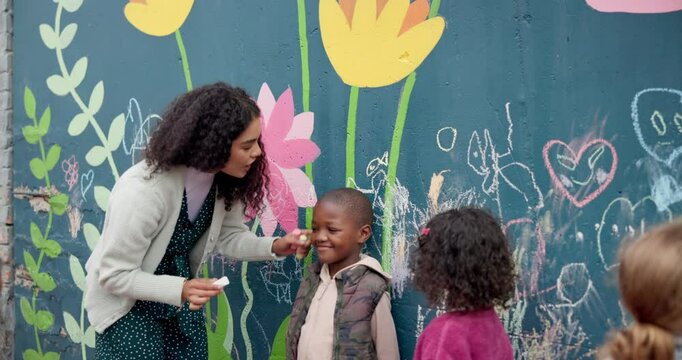 Teacher, mural and height with children and wall for friends, painting or measuring growth. Flowers, learning and kindergarten street art with group of kids and woman for education and drawing