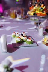 An assortment of delicious snacks on the festive table in the restaurant.