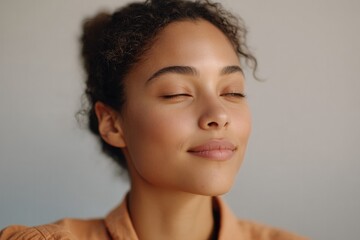 serene portrait of diverse individual representing familial values against blurred backdrop