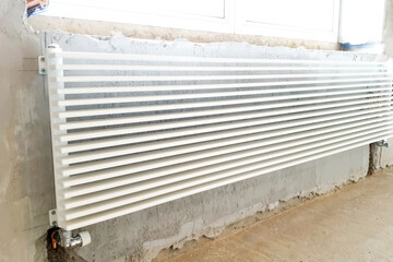 White radiators of heating system. New building house, heating i