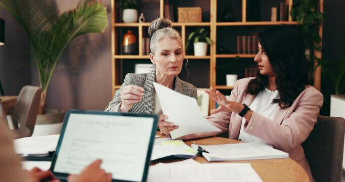 Meeting, documents and business women in office for legal consulting, case review and strategy. Professional, attorney team and people on laptop with paperwork for discussion, agreement and planning