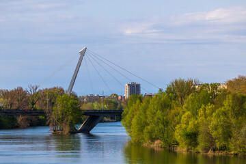 View of the Pont Saint-Michel, with the Passerelle Robert Poujade recognizable by its mast in the background, from the Pont Neuf