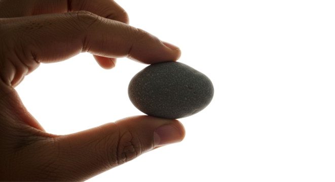 Hand holding a small stone transparent background