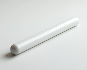 Sleek white ceramic rolling pin, ideal for baking and pastry making.  Smooth surface, easy to clean
