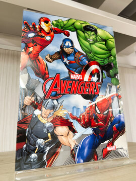 Colorful comic book cover Avengers featuring popular superhero characters in dynamic poses