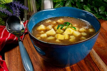 Sour soup with mushroom.