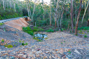 Photograph of major road repairs on Megalong Road after high rainfall and flooding caused dangerous landslides in the Megalong Valley in the Blue Mountains in Australia.