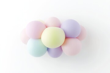 Pastel colored balloons clustered together, forming a cloud shape on a plain white background