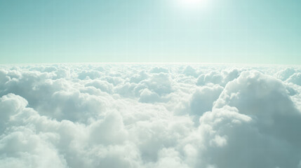 Naklejka premium Above the Clouds: A breathtaking panorama of a sea of fluffy clouds stretching endlessly under a clear, bright sky.