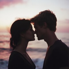 A couple shares an intimate sunset kiss by the ocean, the colorful sky reflecting their tenderness and deep connection on a balmy shore.