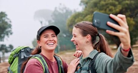 Women, friends and selfie for hiking outdoor with photography, adventure vlog and social media post. Smile, people and laughing for live streaming, profile picture update and travel journey in nature