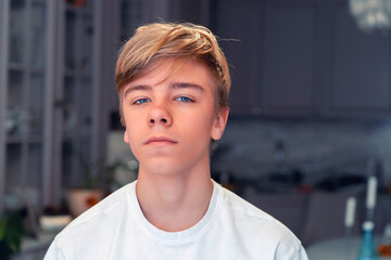 Teen's Gaze: A Young Man's Portrait with a Confident Stare