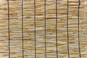 Woven bamboo decorative mat as a creative backdrop