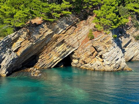 Sea and layered rocks. 